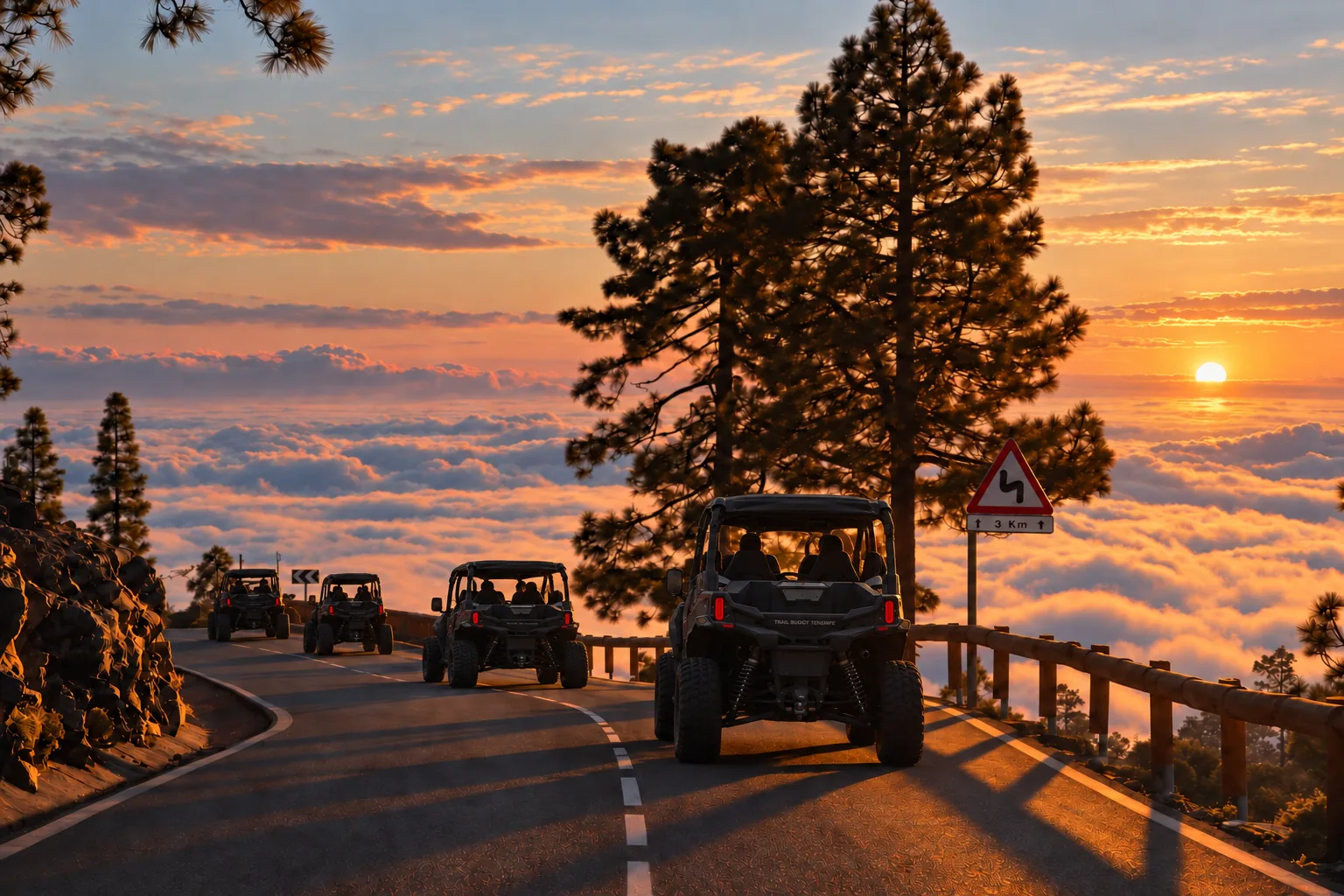 A convoy of buggies above a sea of clouds at sunset