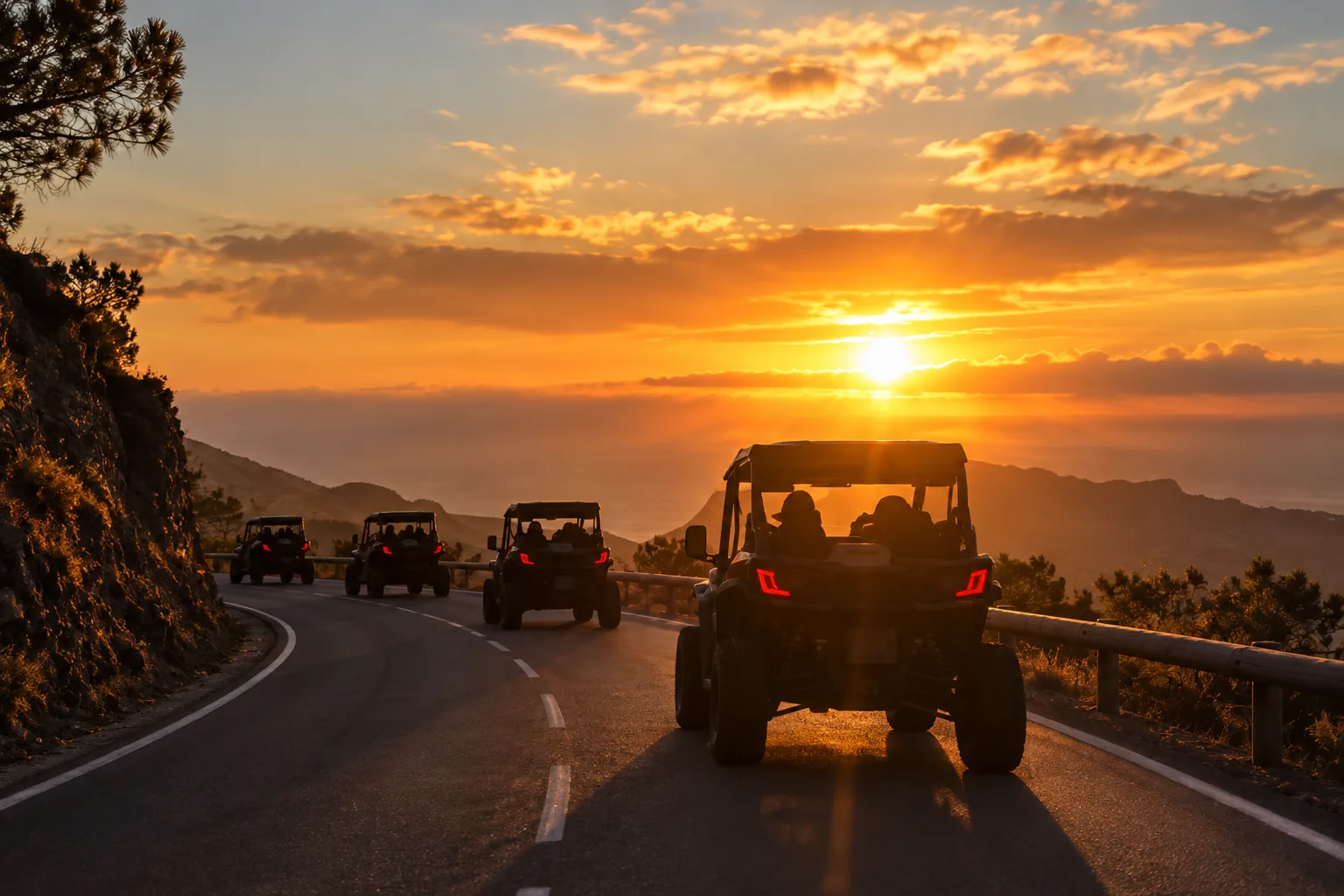 A convoy of buggies driving in single file at sunset